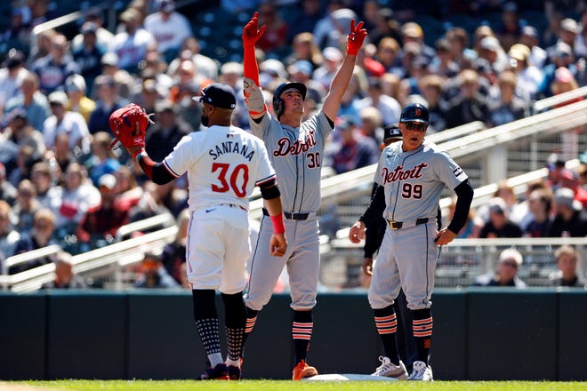 The Tigers' Kerry Carpenter celebrates his RBI single against the Minnesota Twins in the first inning.