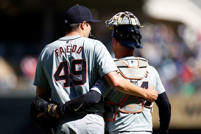 Tigers reliever Alex Faedo and catcher Jake Rogers celebrate their victory against the Twins.