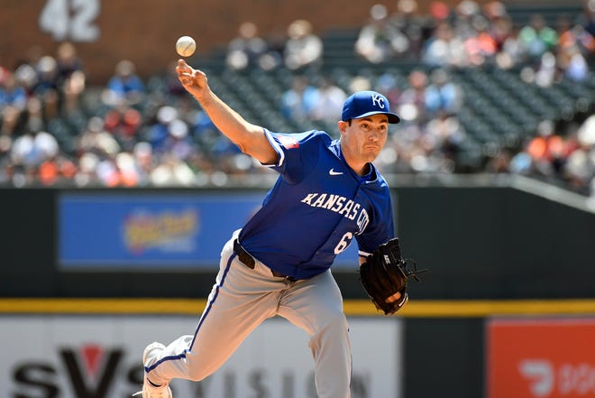 Royals starting pitcher Seth Lugo throws against the Tigers in the first inning.