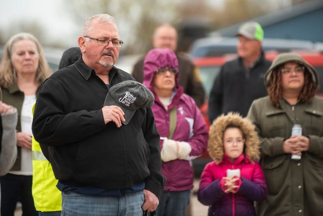 Community members gather to remember Alanah Phillips, 8, and Zayn Phillips, 4, before a vigil in their honor on Friday, April 26, 2024, at the Swan Boat Club in Newport, Michigan.