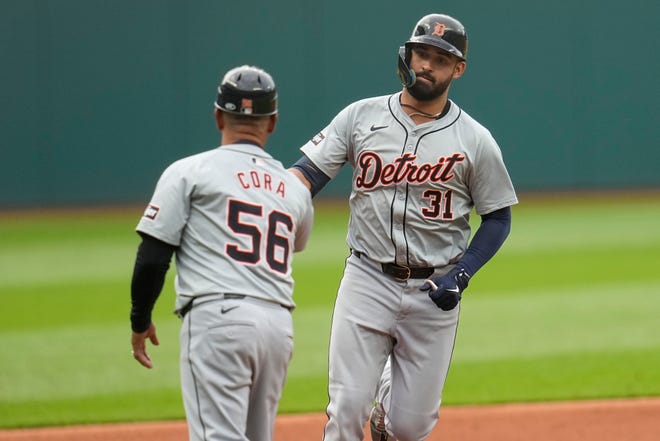 Detroit Tigers' Riley Greene (31) is congratulated by third base coach Joey Cora (56) as he runs home with a home run in the first inning.