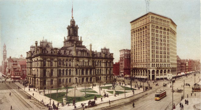 The 1899 view of Campus Martius was dominated by Detroit's old City Hall, facing Woodward Avenue. It was dedicated in 1871 and stood until 1961. The Majestic Building at right was demolished in 1962.