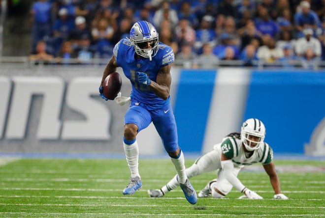 Lions wide receiver Kenny Golladay (19) set career highs Monday night with seven catches for 114 yards.