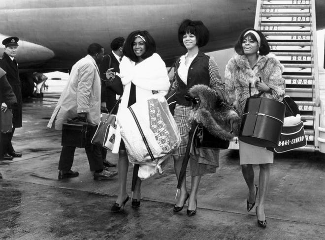 The Supremes returned to London in 1965. Above, Mary Wilson, Florence Ballard and Diana Ross arrive at London's Heathrow Airport.