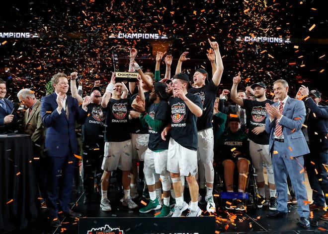 Wright State players celebrate their win against Cleveland State in the championship game of the 2018 Horizon League tournament in Detroit.