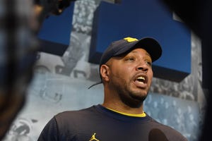 "Literally, he gave me the keys ... to the car," Michigan offensive coordinator Josh Gattis said about coach Jim Harbaugh handing him the keys to a rental car before going on recruiting trip.