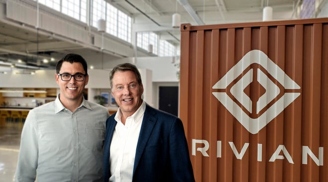 Rivian founder and CEO R.J. Scaringe and Ford Motor Co. Executive Chairman Bill Ford posed for a photo in January, when they announced the two would work together on a new Ford SUV based on Rivian underpinnings.