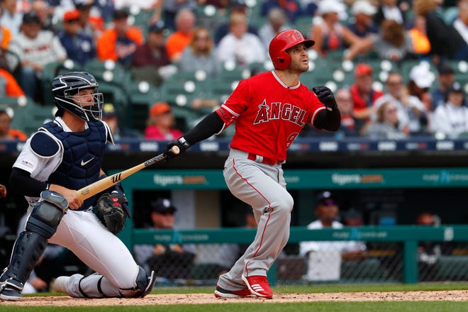 The Angels' Tommy La Stella hits a two-run home run in the second inning. He had two home runs on the day.