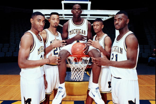 Michigan's Fab Five from left, Jimmy King, Juwan Howard, Chris Webber, Jalen Rose and Ray Jackson are shown in this Nov. 1991 file photo in Ann Arbor, Mich.