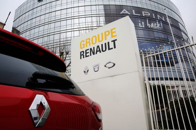 A Renault car parking outside the French carmaker headquarters in Boulogne-Billancourt, outside Paris, France.