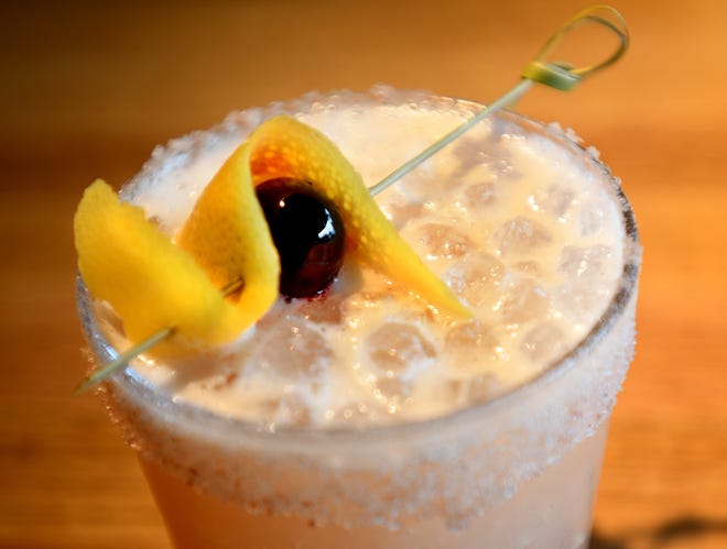 The Salty Dog consisting of Valentines White Blossom vodka, grape fruit juice with egg white froth.