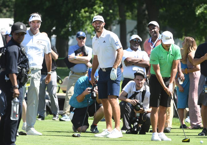 Golfers Bubba Watson, Dustin Johnson and Rickie Fowler get ready for the Area 313 Celebrity Challenge.