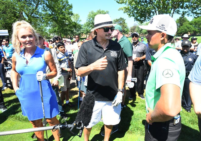 Golfer Blair O'Neal, Kid Rock and golfer Rickie Fowler chat before the celebrity challenge.