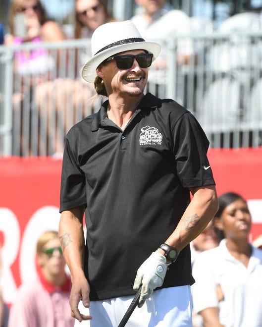 Kid Rock watches his drive off the 15th tee.