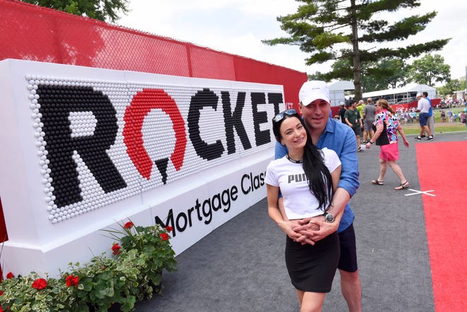 Stefanie Andrews and her husband Sol, of Detroit, enjoy the third round of the Rocket Mortgage Classic on Saturday.