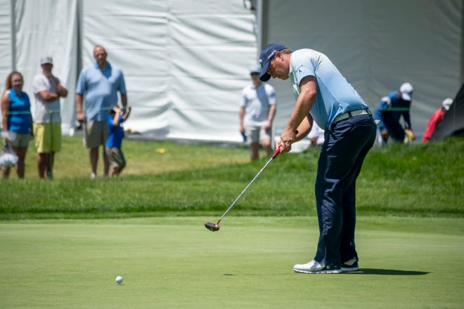 Brian Stuard putts on the second hole during the final round of the Rocket Mortgage Classic.