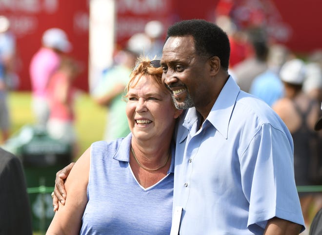 Vicki Wurm, left, shares a moment was boxer Thomas Hearns.