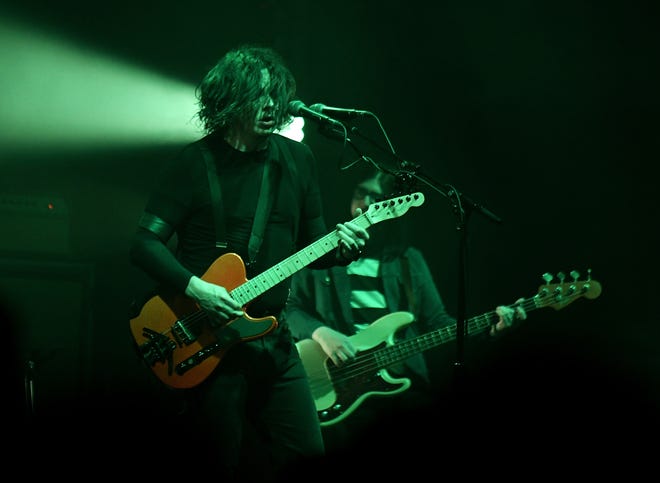 The Raconteurs'  Jack White on guitar and vocals, left, and Jack Lawrence on bass.