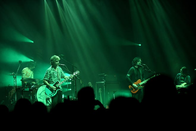 The Raconteurs, from left, Patrick Keeler on drums, Brendan Benson and Jack White on guitars and Jack Lawrence on bass, go into "Level."