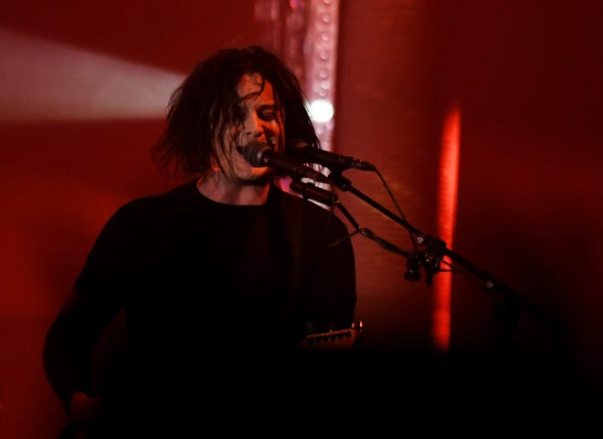 The Raconteurs play with Jack White on vocals and guitar during "Bored and Razed."