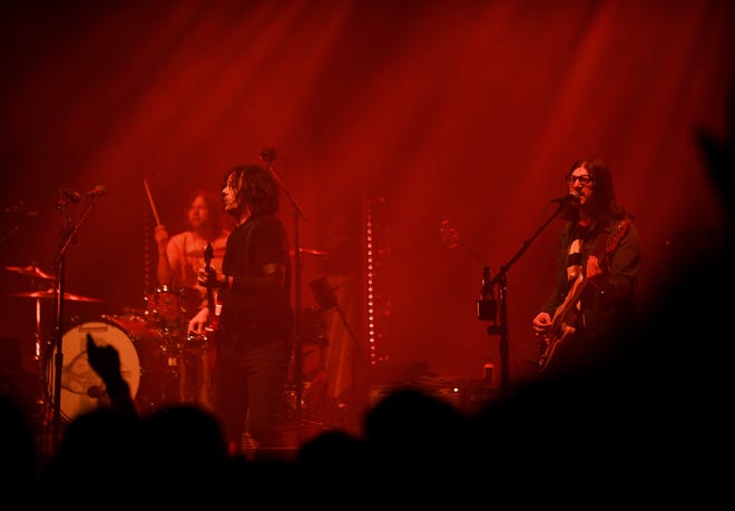 The Raconteurs', from left, Patrick Keeler on drums, Jack White on guitar and Jack Lawrence on bass.