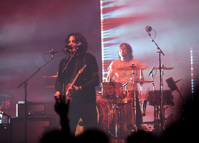 The Raconteurs' Jack White on vocals and guitar and Patrick Keeler on drums.