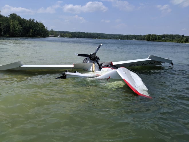Isabella County sheriffs are investigating the crash of a single-engine, two-seat plane that hospitalized two men Saturday on Littlefield Lake in the northern part of the county.