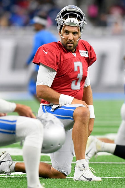 Lions quarterback Tom Savage stretches during the open practice session at Lions Family Fest.