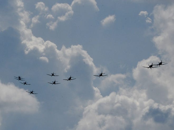 Ten Vought F4U Corsairs in the sky over Willow Run Airport during the Thunder Over Michigan Air Show.