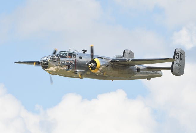 The majestic yet deadly B-25 'Yankee Warrior' takes to the sky over Willow Run Airport.
