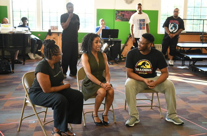 In this scene, The Marvelettes' Katherine "Kat" Anderson, center, portrayed by Jenia Head, is asking her parents for permission to sign the Motown contract, since she is under 18 at the time. The parents are portrayed by Joshua Davis, right, and Patrice Harbert, left, at rehearsal.