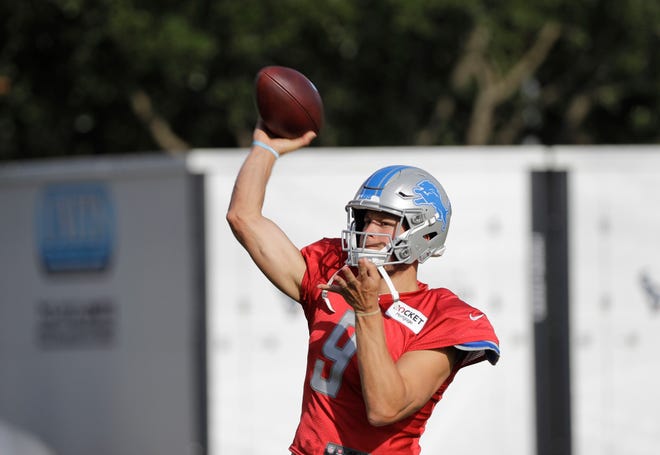 Lions quarterback Matthew Stafford throws a pass during practice.