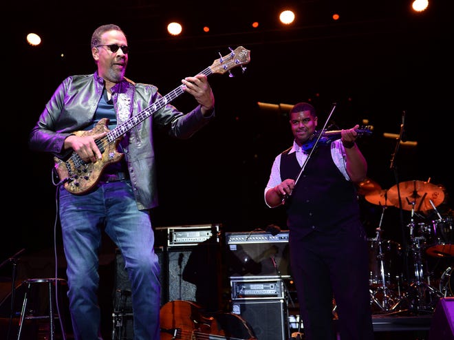 2019 Artist-in-Residence, Stanley Clarke, (l), and his band performs on the JP Morgan Chase Main Stage.