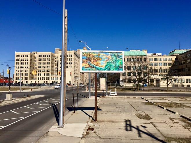 Four of Macdonald's works are on long-abandoned billboards throughout Detroit.