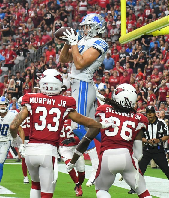 Lions rookie tight end T.J. Hockenson catches his first NFL touchdown in the fourth quarter of the 27-27 tie with the Arizona Cardinals in Phoenix, Arizona on September 8, 2019.