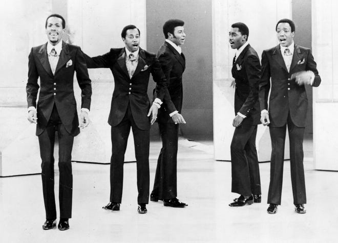 Motown's other superstar male vocal group,  The Temptations,  perform on a TV show in 1969. Known for their harmonies and slick dance moves, the group was formed by combining two Detroit groups, the Distants and the Primes. From left are Eddie Kendricks, Melvin Franklin, Dennis Edwards, Otis Williams and Paul Williams.