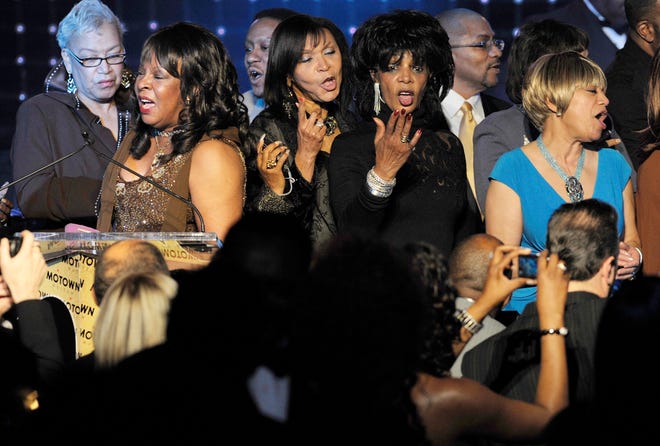 Martha Reeves (second from left) of Martha and the Vandellas joins a host of others onstage for a rendition of Stevie Wonder's "Signed Sealed Delivered" to close the show at the Motown 50 Golden Gala at the Renaissance Center on Nov. 21, 2009.