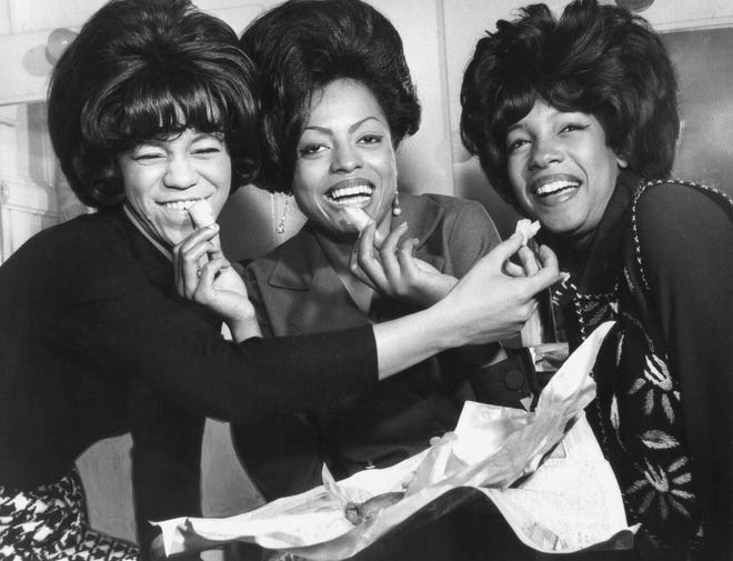 For a time, The Supremes, seen here eating fish and chips on a visit with the Motown Revue to London, England, rivaled even the Beatles in terms of commercial appeal, recording five No. 1 singles in a row.