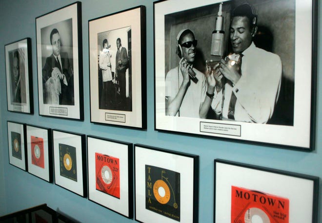 In this Jan. 20, 2006 photo, 45's and photographs, including Marvin Gaye and Stevie Wonder in photo at right, are on display at the Motown Museum gallery in Detroit.