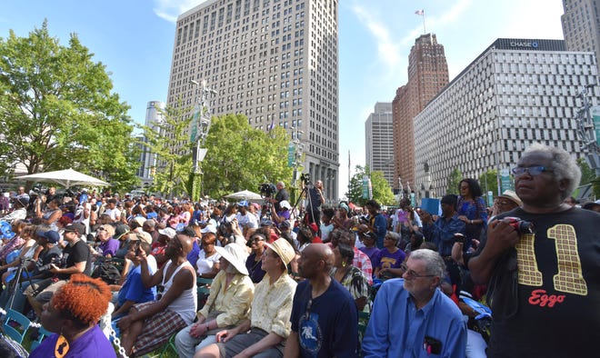 Throngs of people witness the celebration at Campus Martius.
