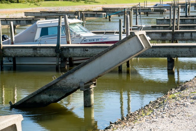 High water levels over the summer are partially to blame for damaged and tilting piers at the Luna Pier Harbor Club marina in Luna Pier.