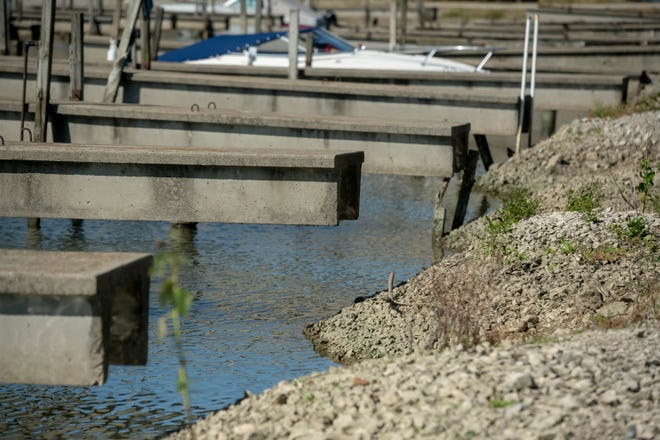 Gaps between the boat slip piers and the berm at the Luna Pier Harbor Club marina in Luna Pier show the  erosion that occurred due to high lake levels this summer.
