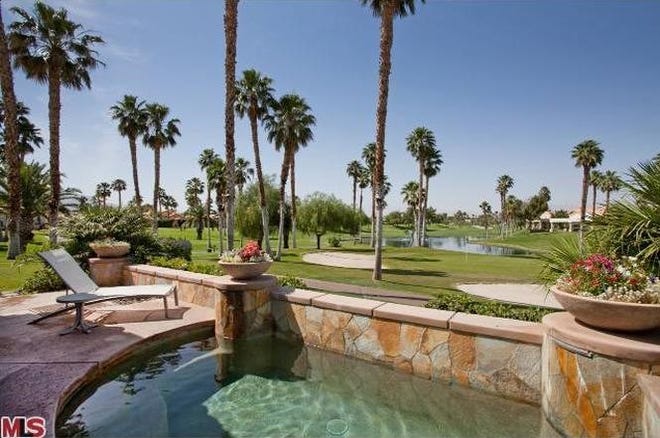 A view from the pool overlooking the Desert Princess Country Club.