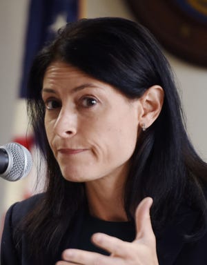 Michigan Attorney General Dana Nessel answers questions from the media in this Sept. 23, 2019, file photo.