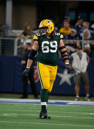 Green Bay Packers offensive tackle David Bakhtiari says he asked officials to watch where Lions defensive end Trey Flowers was placing his hands during the pass rush, before Flowers was called twice for hands-to-the-face penalties.