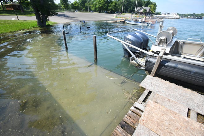 A temporary dock and walkway is a foot underwater at the launch site at Elizabeth Park in Trenton on July 1, 2019.