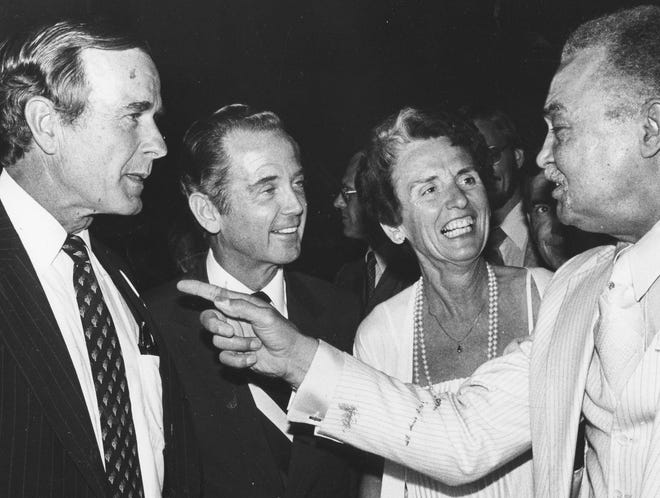 Vice President George H.W. Bush, Gov. Milliken, Helen Milliken and Detroit Mayor Coleman Young converse at an event on July 28, 1980.