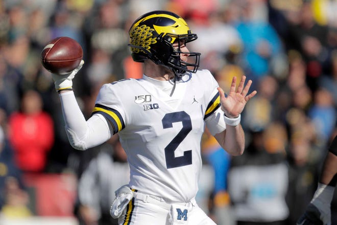 Michigan quarterback Shea Patterson throws a pass against Maryland during the first half.