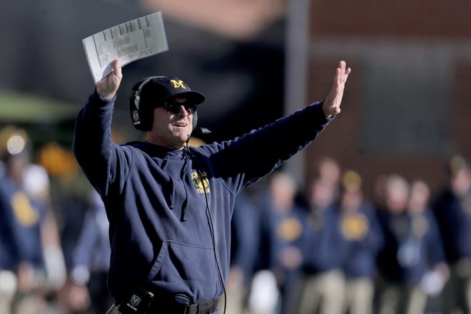 Hold up. Michigan coach Jim Harbaugh has a solution to fix the College Football Playoff. It involves expanding the field from four to 11 teams.