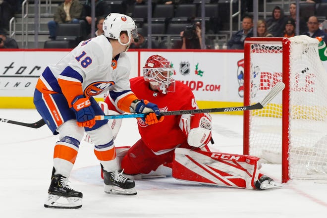 New York Islanders left wing Anthony Beauvillier (18) scores on Detroit Red Wings goaltender Jonathan Bernier (45) in the first period.